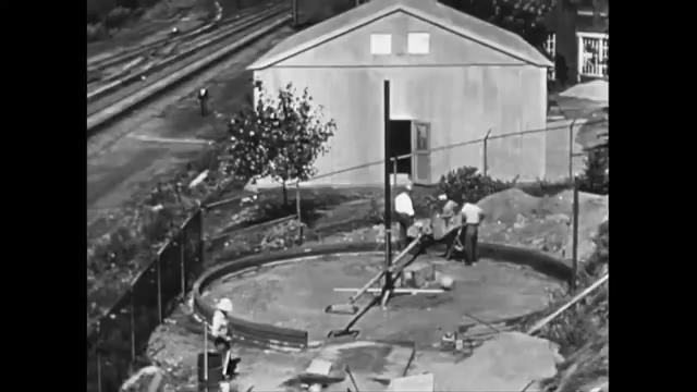 Construction en béton imprimée couche par couche par William E. Urschel
